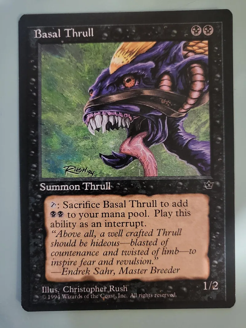 Dark purple dragon creature card art, Basal Thrull, black frame.