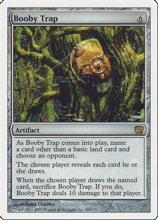Green, mossy trap object on a card titled "Booby Trap.
