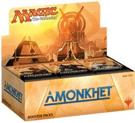 Box of Amonkhet Magic: The Gathering booster packs with orange and gold artwork.