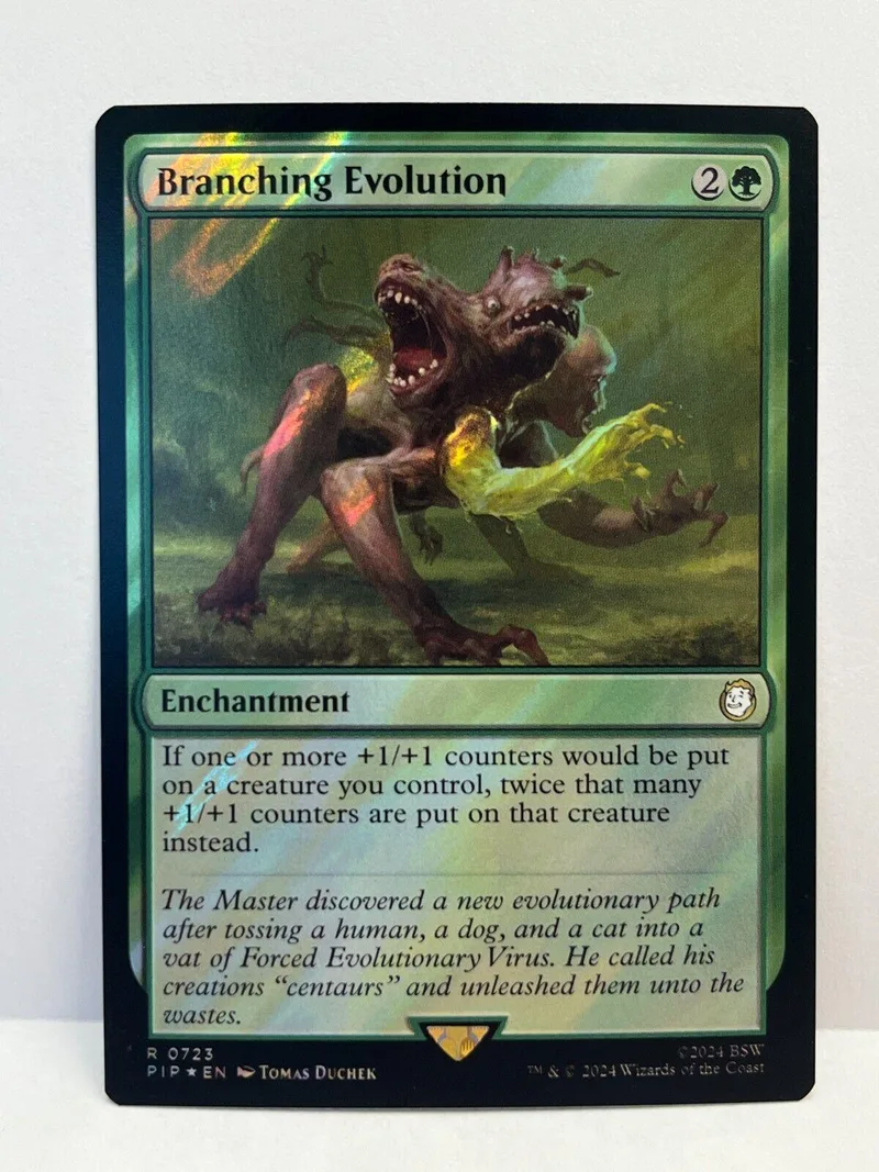 Dark, monstrous creature on a green field, "Branching Evolution" card.