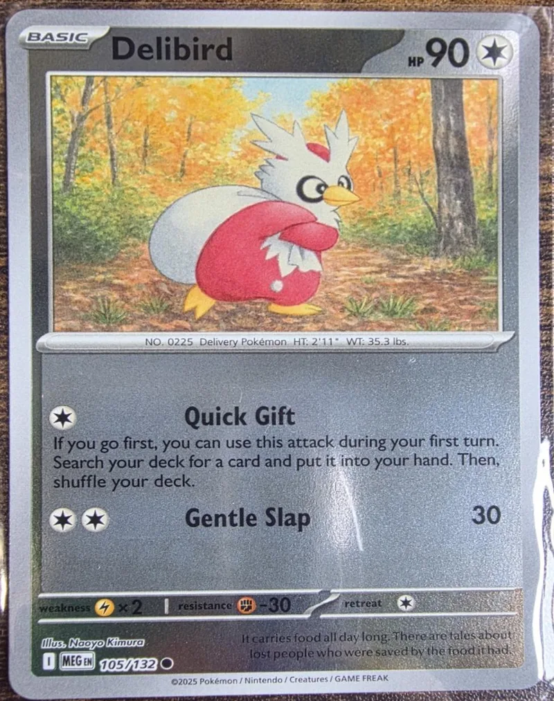 Delibird Pokémon card, white and red, showing bird in forest setting.