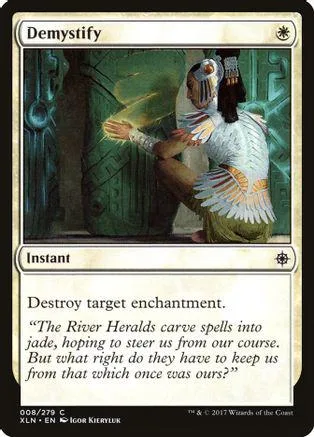 White and green card art of a figure in tribal attire. Demystify instant spell.