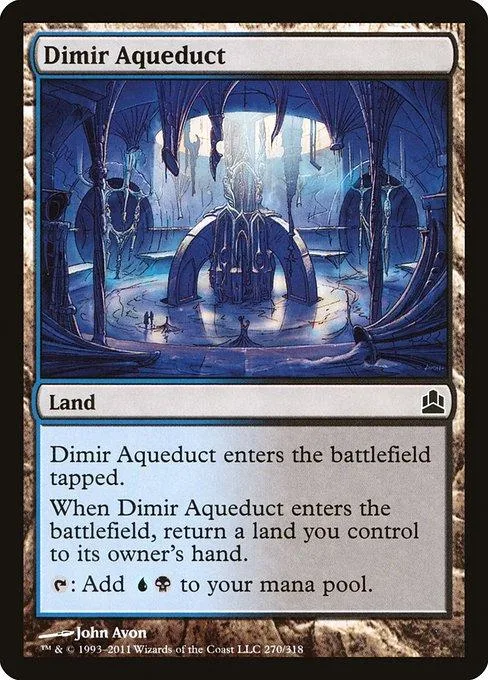 Blue and black land card art showing a glowing archway in a cavern.