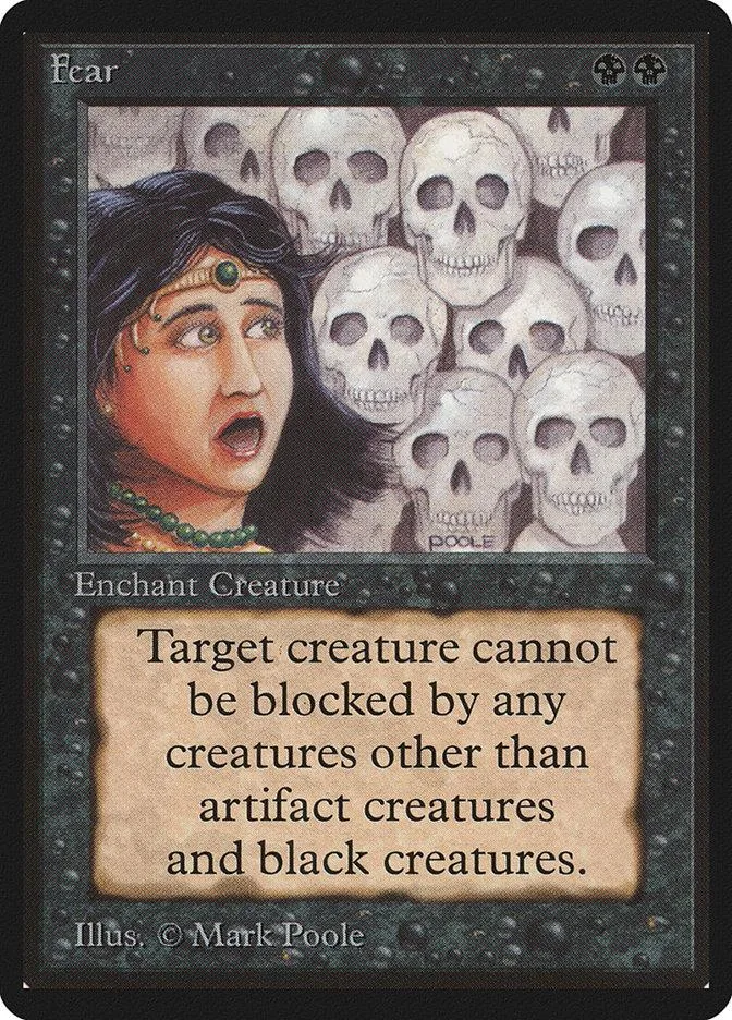Card art shows woman among skulls. Black and white design.
