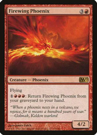 Red and orange phoenix creature card with fiery wings and text box.