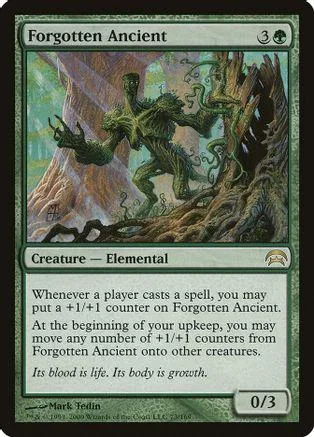 Green elemental creature in a forest setting on a Magic: The Gathering card.