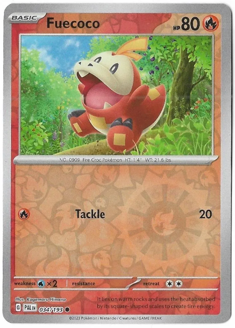 Red and white Pokémon card featuring a fire-type creature in a green forest.