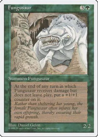 Green card art depicts a large, monstrous creature with sharp teeth.
