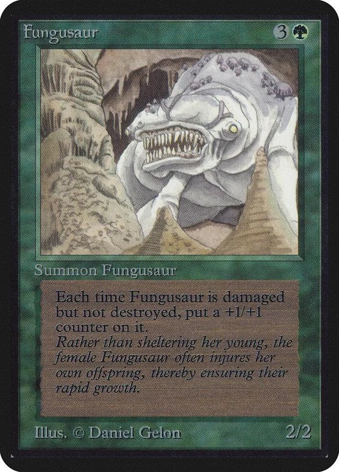 Card art depicts a large, pale, monstrous creature in a rocky, earthy environment.