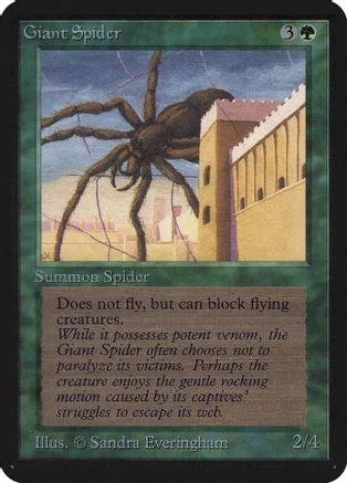 Dark brown giant spider on a building against a muted landscape.