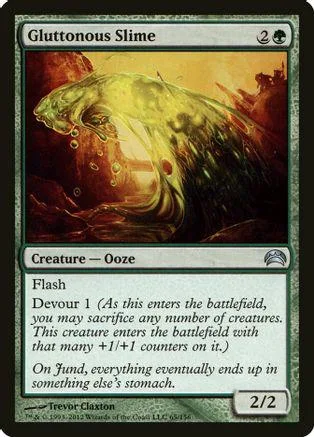 Yellow and brown slime creature on card art, showing a large, undulating form.