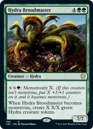 Green hydra monster card art, showing multiple serpentine heads in a dark, earthy setting.