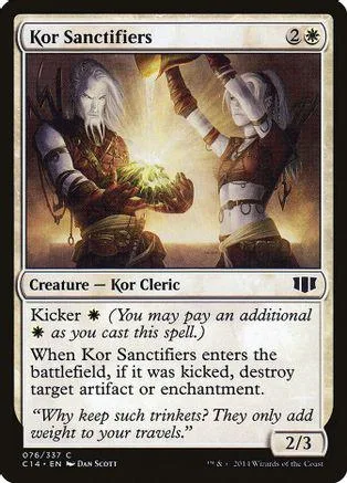 Card art shows two figures casting glowing magic. Black and white card frame.