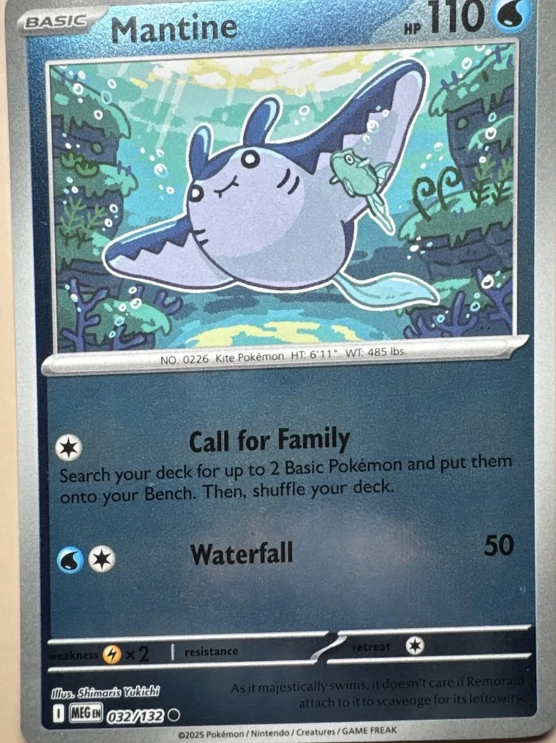 Blue and white Pokémon card featuring a large, stylized sea creature.