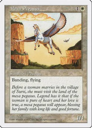 White and brown winged horse flying over a desert mesa landscape.