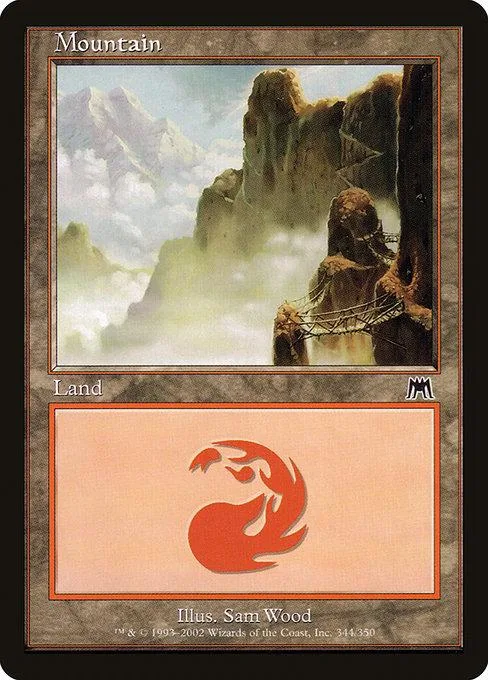 Mountain land card art showing misty mountains and rocky terrain.