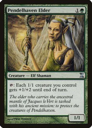 Elf shaman with white wings holds staff; green and brown card art.