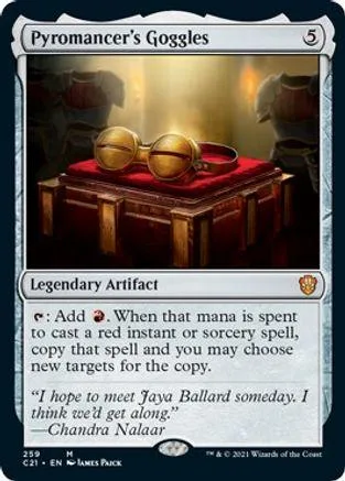 Gold goggles resting on a red velvet cushion, showing a collectible card.