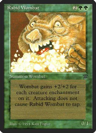 Brown wombat monster card with sharp teeth, white pile, and green border.