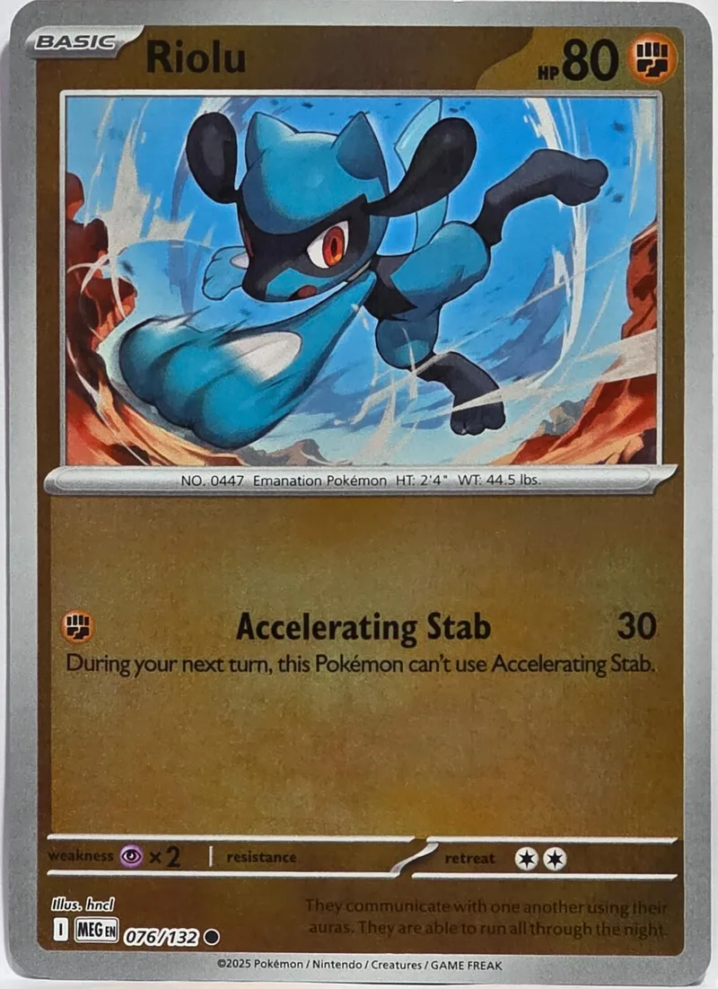 Blue and black Pokémon card featuring a creature in action. Basic energy symbol visible.