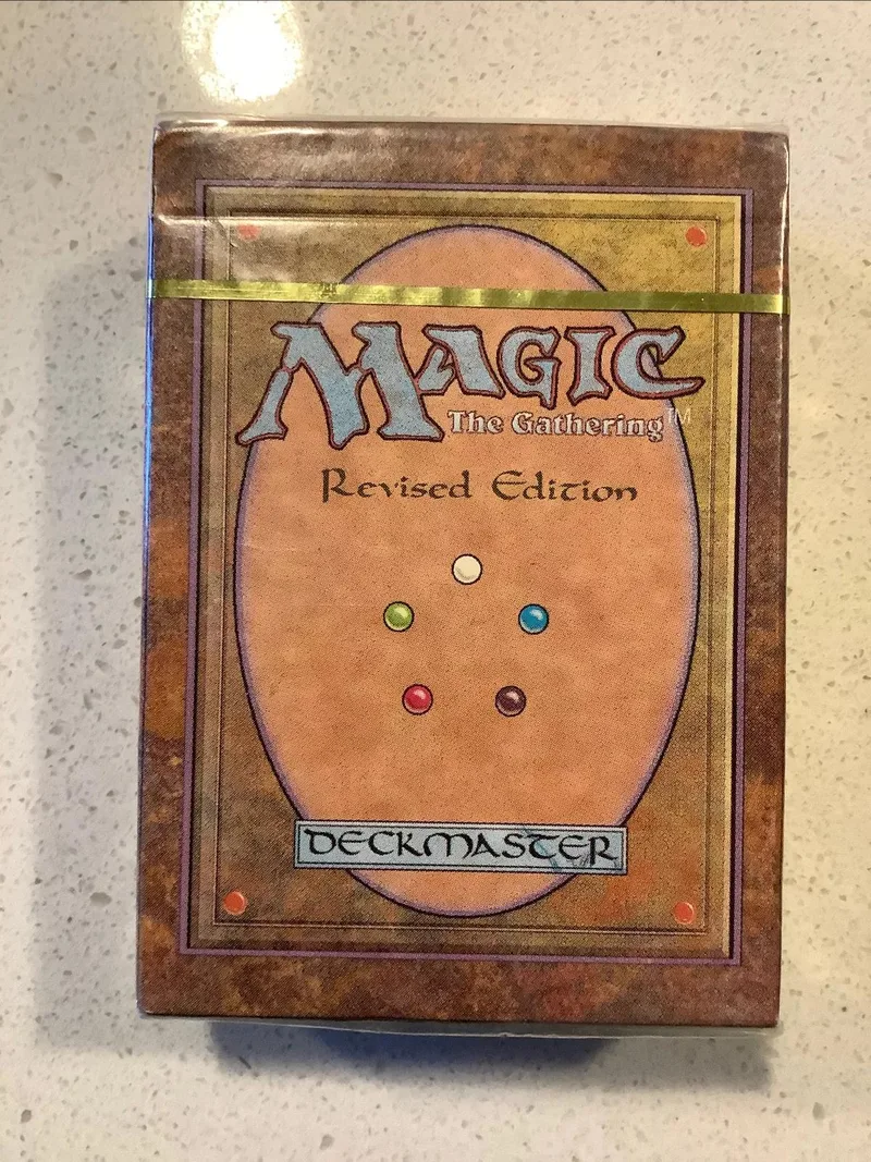 Magic: The Gathering Revised Edition deck box, brown and tan, sealed.
