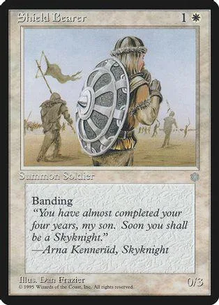 Card art depicts a warrior with a shield in a grassy outdoor scene.