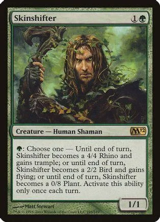 Shaman with dark hair and green foliage, holding a dark, serpentine object.