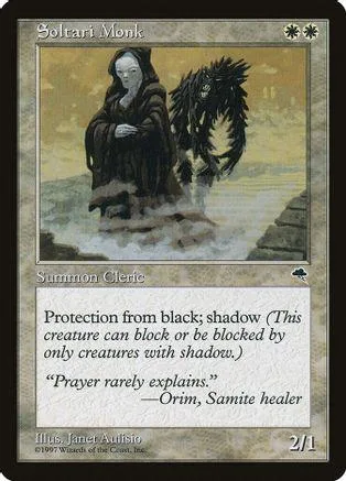 Dark robed figure in water on a card with black and brown tones.