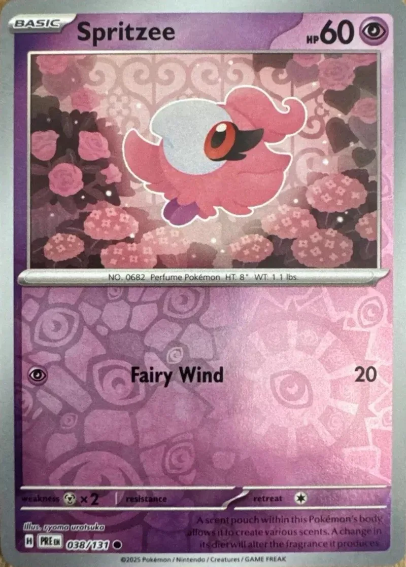 Pink Pokémon card featuring a pink, fluffy creature against a floral background.