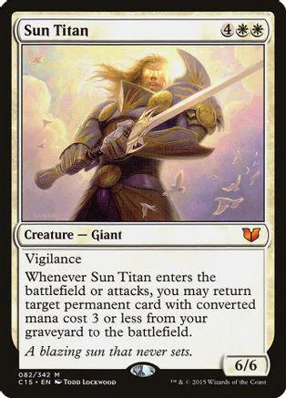 Giant warrior with sword, golden armor, on a purple and yellow battlefield.