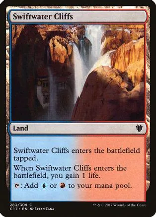 Card art shows a waterfall cascading between orange and brown cliffs. Land type.