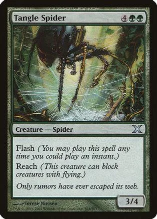 Black spider creature card art in a green and brown forest setting.