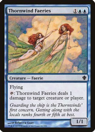 Two fae creatures in green and brown, flying over a landscape.