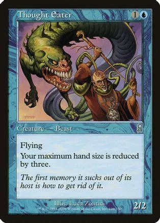 Green dragon creature card with blue and purple fantasy art.