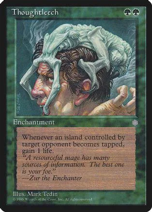 Skull-like creature head on a green card with white and grey tones.