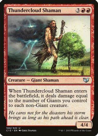 Shaman figure with staff in stormy outdoor setting on a trading card.