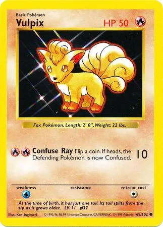 Yellow fox Pokémon card, Vulpix, with black background art.