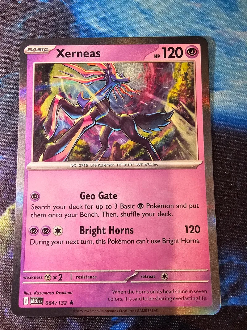 Purple and black dragon Pokémon card, Xerneas, with HP 120.