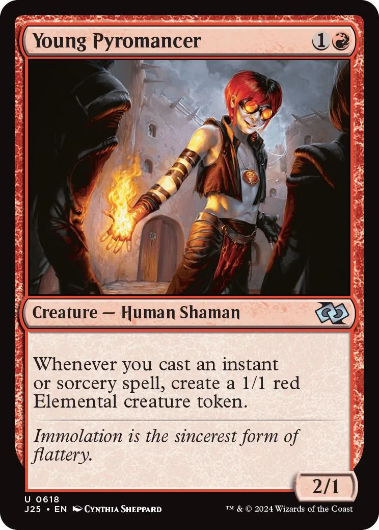 Card art shows young man with red hair conjuring fire in a stone setting.