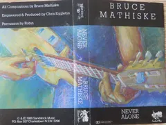 Bruce Mathiske – Never Alone (Cassette, Album)