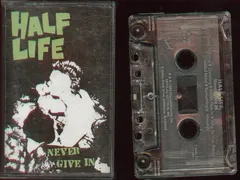 Half Life – Never Give In (Cassette, Album)