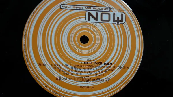 Now (2) – You Spin Me Round