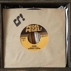 Stereo Luchs – Dame / Under Mim Guinness (Vinyl, 7")
